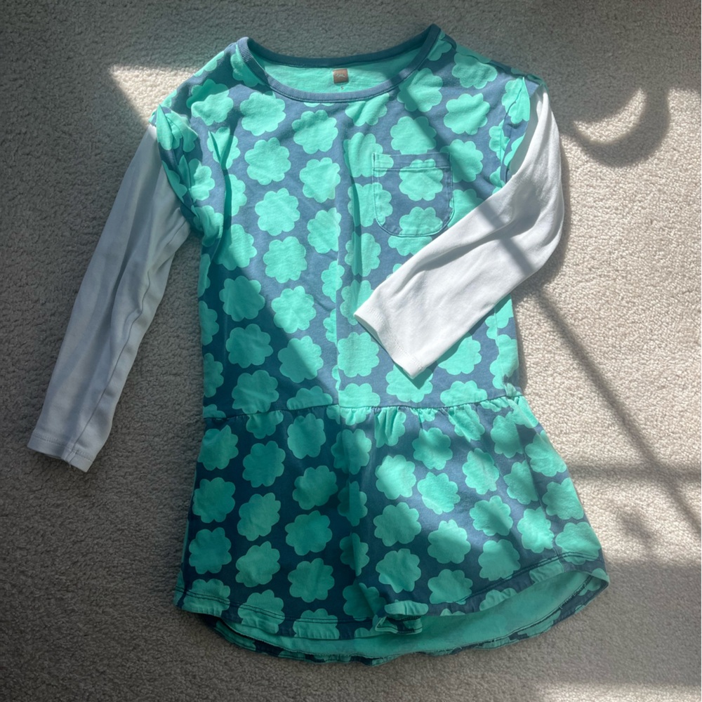 Layered dress with playful pattern.
